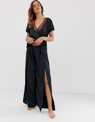 Bluebella Adeline long pyjama set with thigh split in black | ASOS