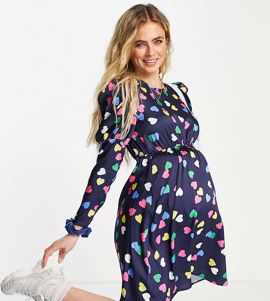 Blume Studio - Zwangerschapskleding - Mini-jurk met geaccentueerde schouders in marineblauw met hartjes