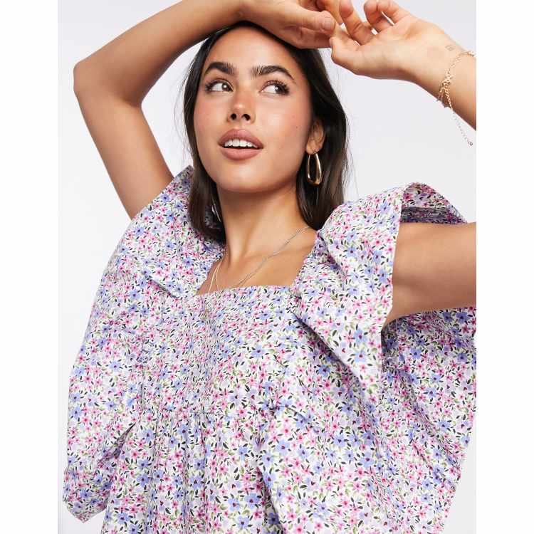 Blusa amplia con escote diseño violeta de Mango |