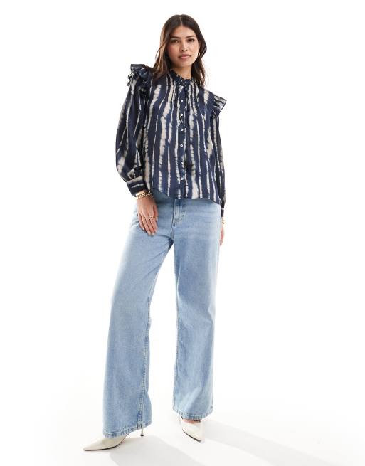 Blusa azul marino estampada con lazada al cuello de Mango