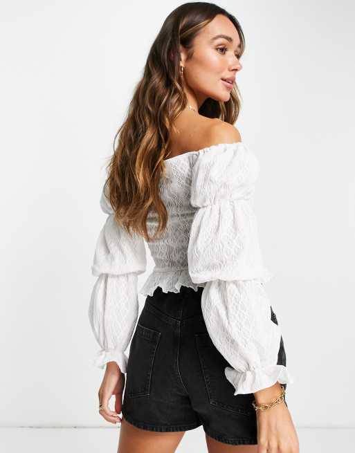 Blusa blanca escotada hot sale