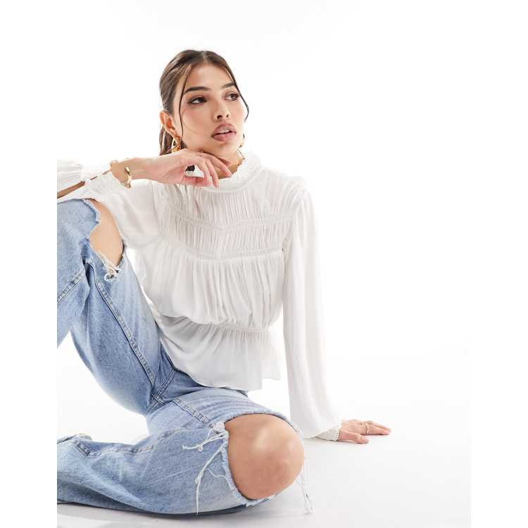 Blusa blanco suave de manga larga con cuello alto y mangas abullonadas de Other Stories ASOS