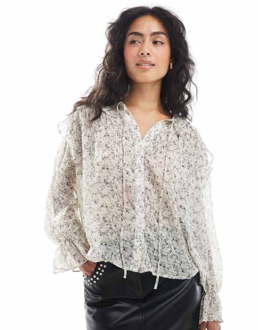 Blusa color crema de estilo boho con estampado floral y ribete de volante de Vero Moda