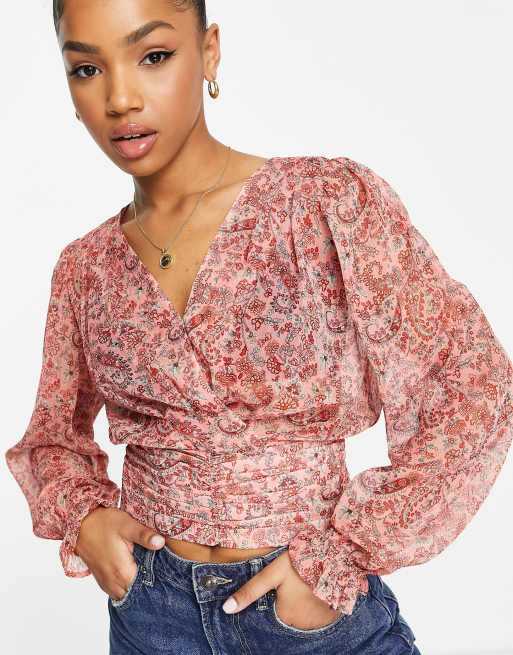Blusa con diseño cruzado y estampado floral de Morgan