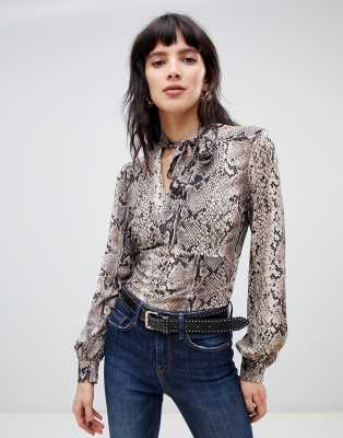 blusa de serpiente
