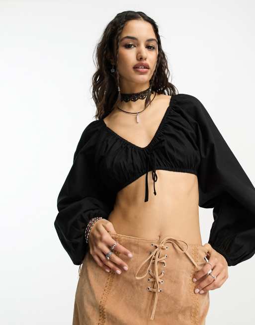 Blusa corta con manga larga deals