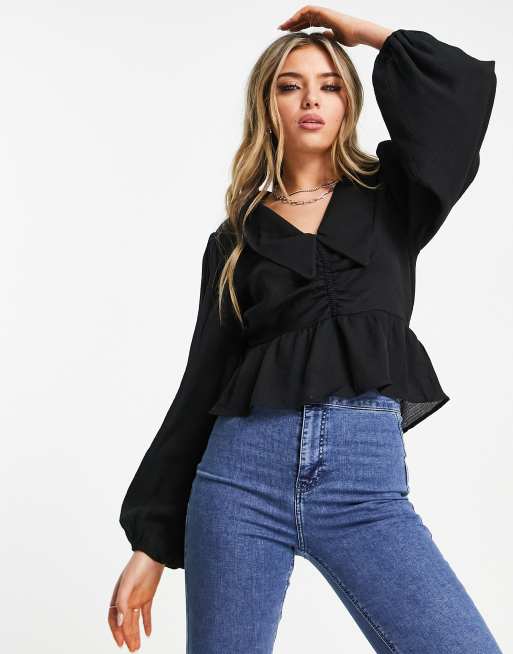 Blusa negra con cuello ca do de Topshop