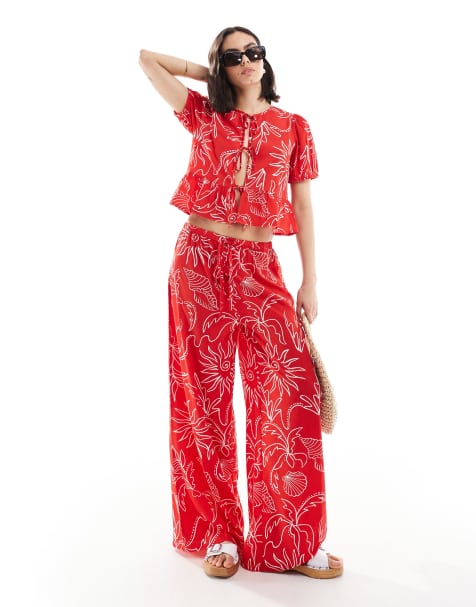 Blusa roja de manga corta con detalle de lazada y estampado de soles de Wednesday's Girl (parte de un conjunto) - view 1