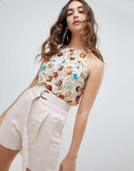 Blusa sin mangas con y cuello subido de River Island | ASOS