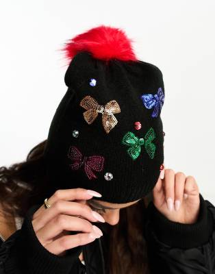 sequin bow embellishment pom pom beanie hat in black