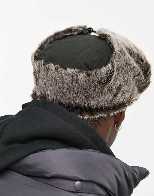 ASOS DESIGN trapper hat with badge in brown faux fur