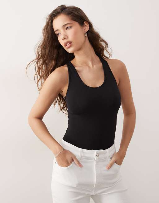 Body deportivo negro elástico en 4 direcciones de ARKET, 4 de 4
