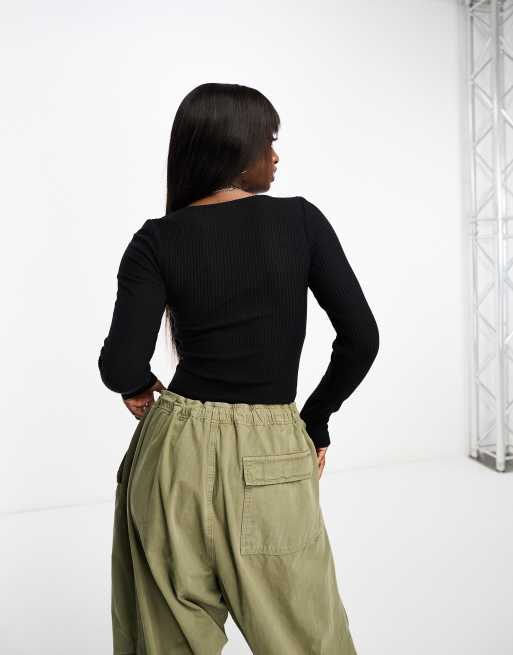 Body negro de manga larga con detalle de en el pecho de canalé de ASOS | ASOS