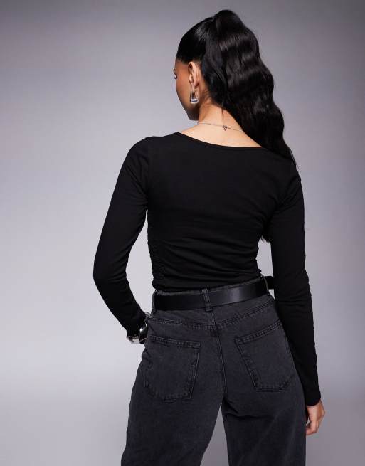 Body negro de manga larga con pecho fruncido y panel de encaje de