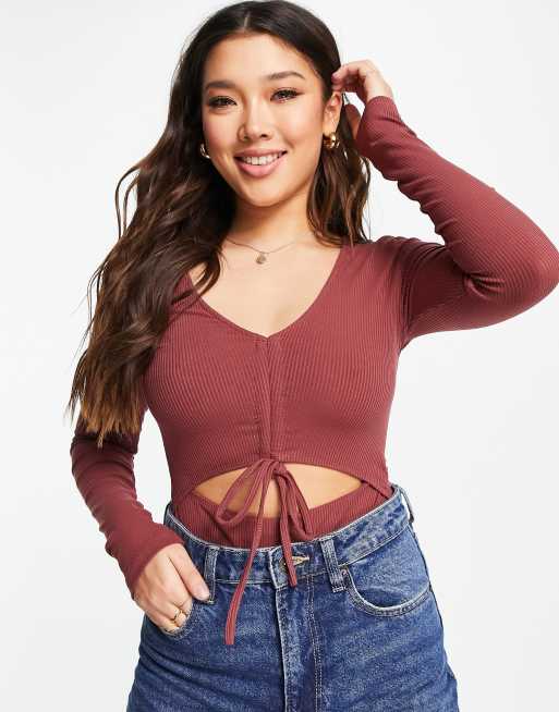 Body rosa polvoriento con lazada en la parte delantera de Gilli