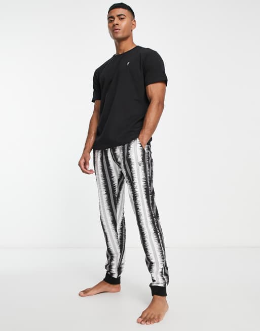Bolongaro Trevor - Loungesæt med sort stribet print og skeletlogo