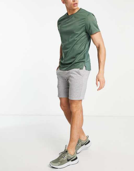 Green shirt clearance grey shorts