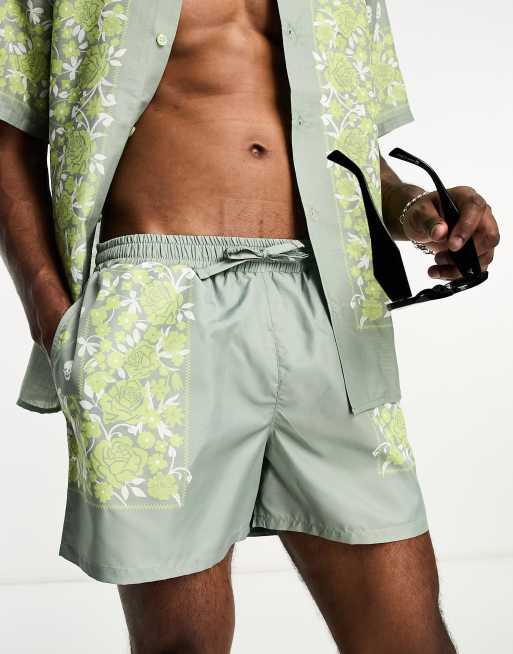 Bolongaro Trevor swim shorts in green bandana skull print