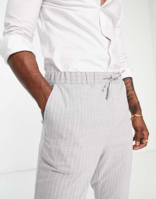 Pinstripe trousers with elastic waistband