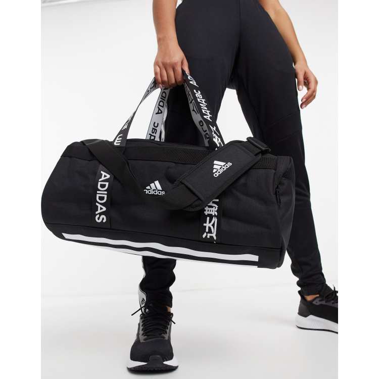 cómo utilizar fluctuar Persistencia Bolsa de deporte negra de adidas | ASOS