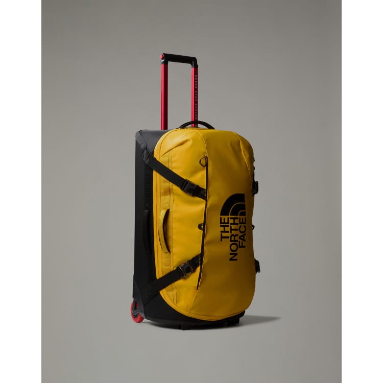 Bolsa de viaje amarilla con ruedas Base Camp de The North Face ASOS