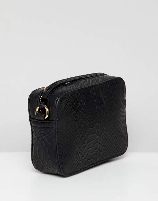 Bolso serpiente best sale blanco y negro