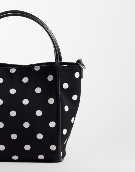 Bolso bombonera monocromático con estampado de lunares y correa bandolera ajustable de ASOS DESIGN, 3 de 4