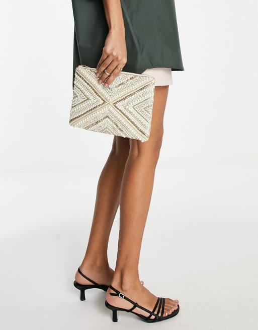 Bolso clutch blanco dorado de cuentas de ASOS DESIGN | ASOS