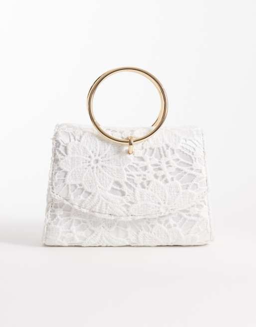 Bolso clutch color crema con bordado inglés de New Look, 1 de 4