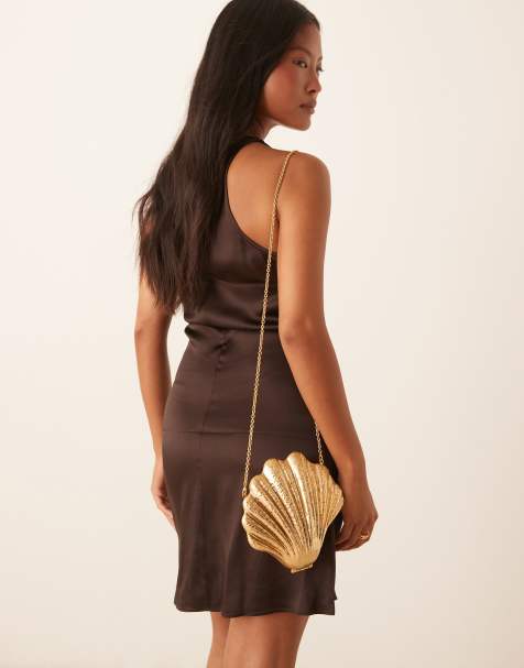 Bolso clutch dorado en forma de concha de Mango - view 1