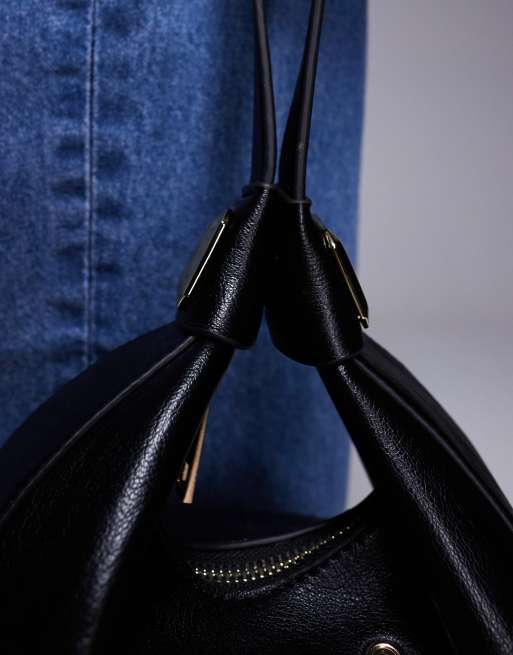 Bolso clutch negro con asa de hombro intercambiable y ojales de ASOS DESIGN, 3 de 4