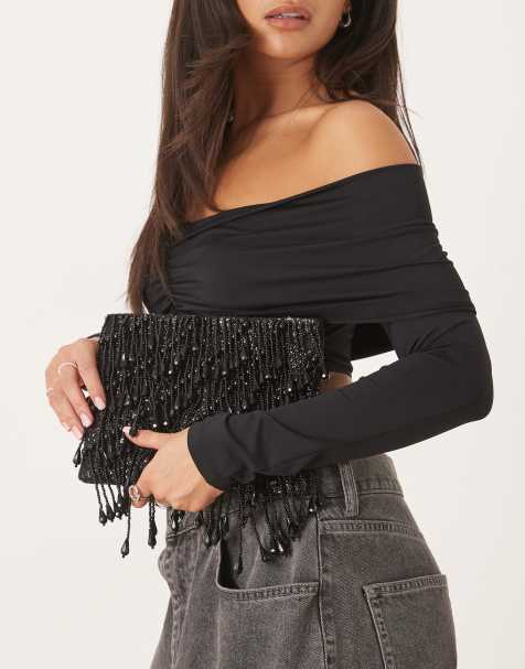 Bolso clutch negro con cremallera superior y detalles colgantes de ASOS DESIGN - view 1