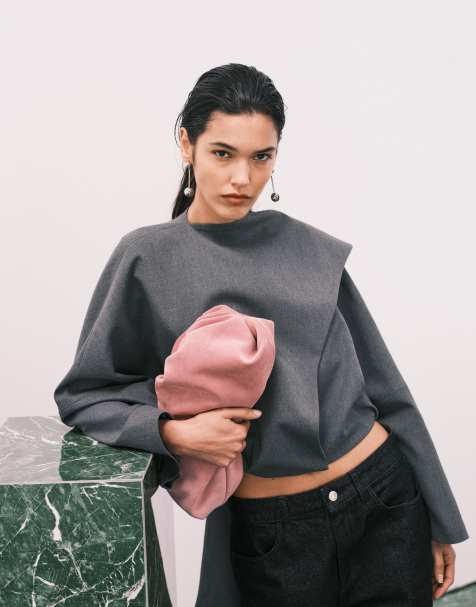 Bolso clutch rosa empolvado con diseño estilo nube de ante premium de ASOS DESIGN - view 1