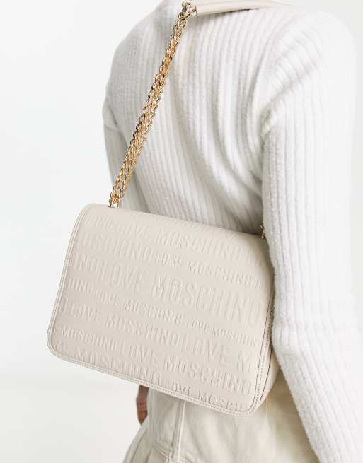 Bolso de hombro beis con solapa superior y logo en relieve de Love Moschino