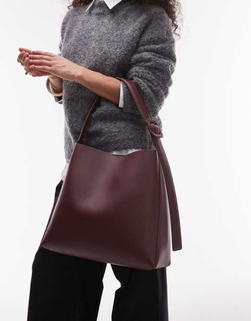 Bolso de hombro burdeos con correa ajustable de Mango