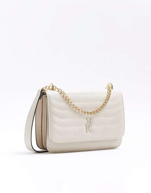 Bolso de hombro color crema guateado con cadena de River Island