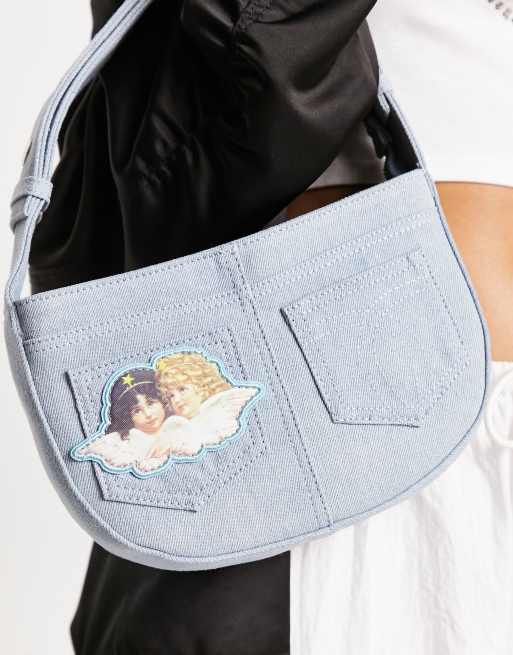Bolso de hombro denim con lavado claro y parche de ángeles de Fiorucci