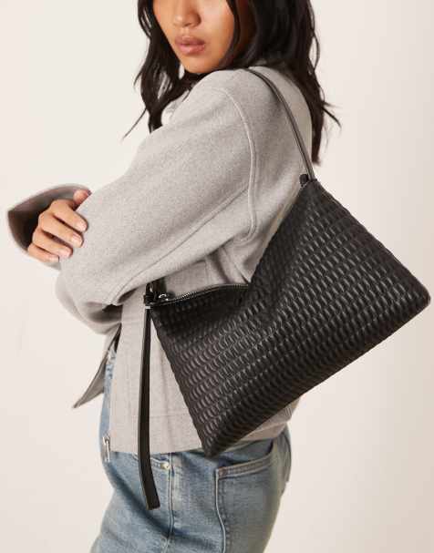 Bolso de hombro negro guateado con hebilla lateral en la correa de ASOS DESIGN - view 1