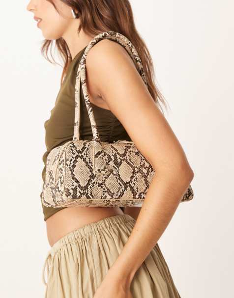 Bolso de hombro pequeño marrón de estilo bolera con estampado de serpiente y dos asas de hombro de Gina Tricot - view 1