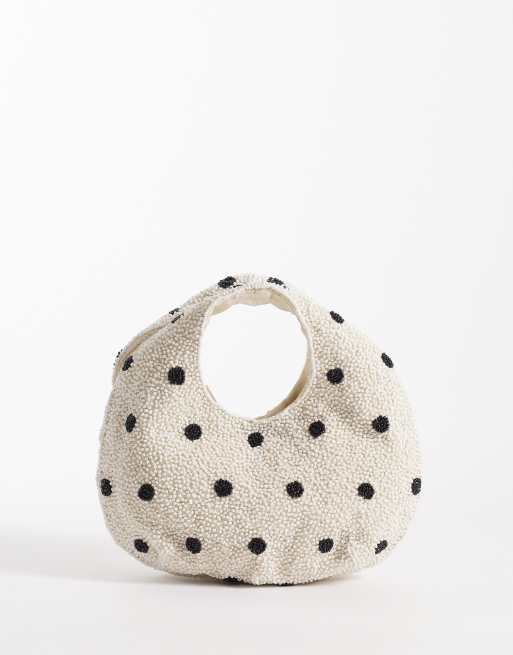 Bolso de mano color crema con estampado de lunares de cuentas de Accessorize