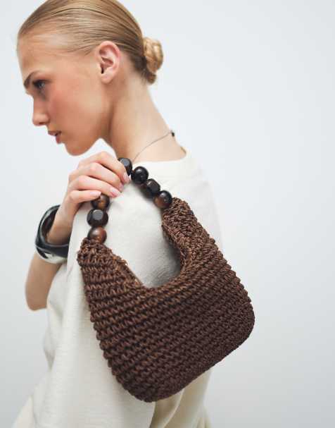 Bolso de mano marrón chocolate de paja con asa de bolas de resina de ASOS DESIGN - view 1