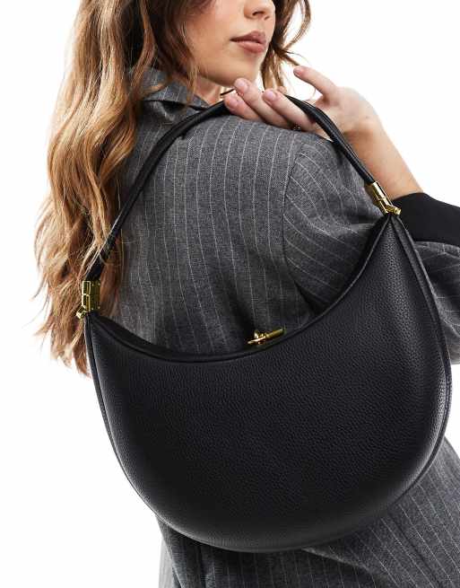 Bolso de mano negro clásico con herrajes dorados de Glamorous 