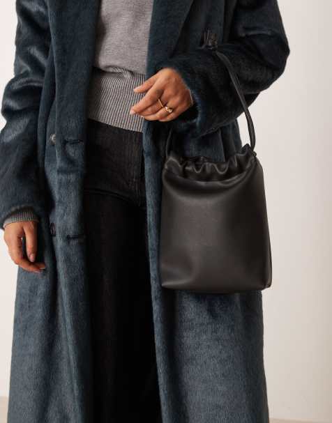 Bolso de mano negro con correa tubular de ASOS DESIGN - view 1