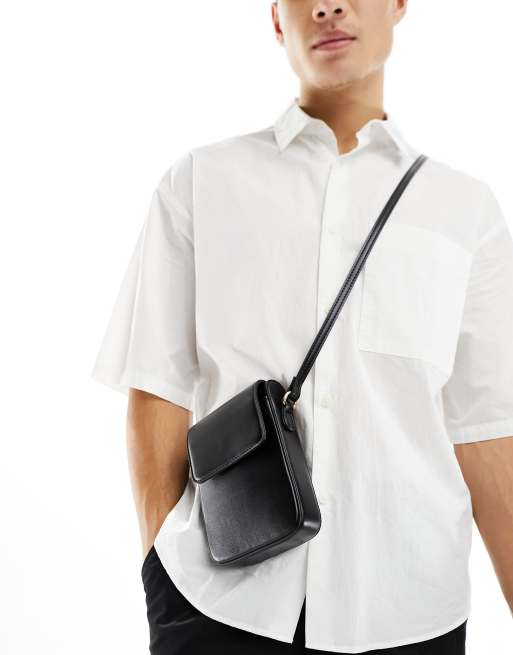 Bolso de mano negro con diseño minimalista de cuero sintético de ASOS DESIGN