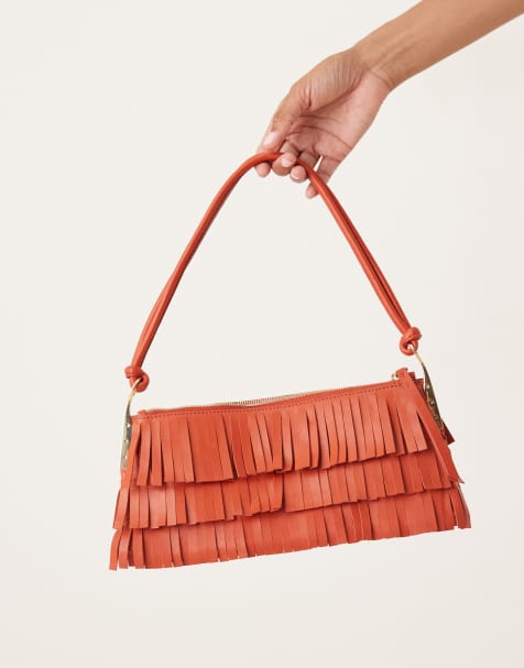 Bolso de mano rojo rústico con detalles dorados y diseño de flecos de cuero de Mango - view 1
