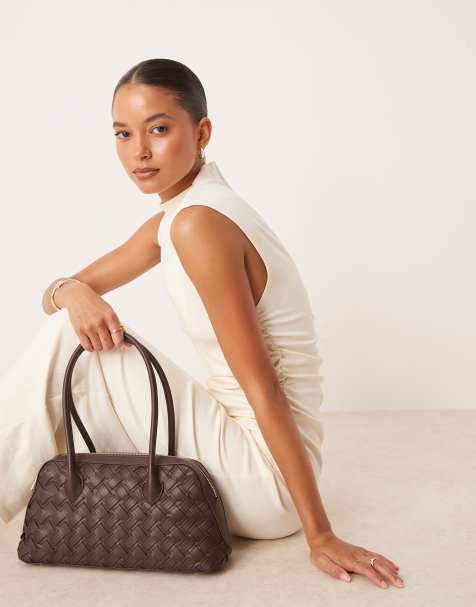 Bolso marrón oscuro estilo bolera con diseño trenzado de cuero sintético de Mango - view 1