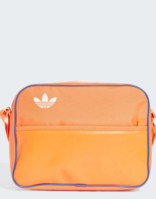 Bolso naranja solar tenue Airliner de adidas Originals