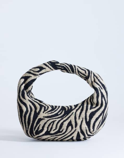 Bolso negro redondeado con estampado de cebra de lona Giane de Topshop - view 1