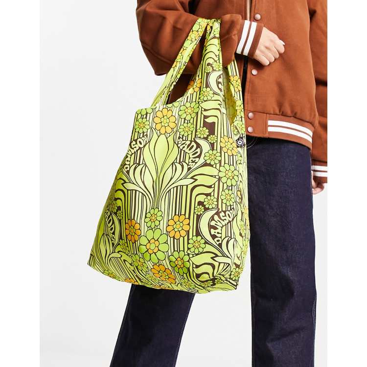 Bolso shopper amarillo con estampado floral de Damson Madder ASOS