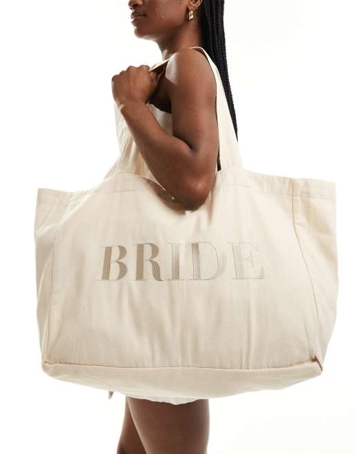Bolso tote color champán con bordado grande de texto 